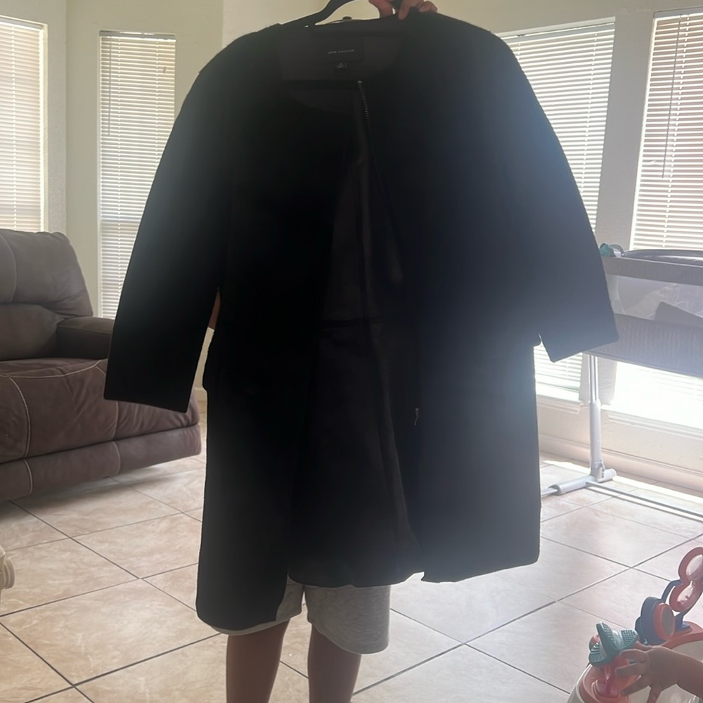 Selling a black long blazer size medium great condition